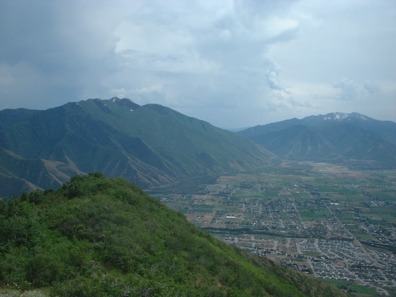 View over the fields and neighborhoods of east Mapleton, Utah, with Hobble Creek and the Wasatch peaks